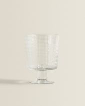 Wine glass with embossed pattern