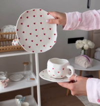 Cups and saucers with hearts